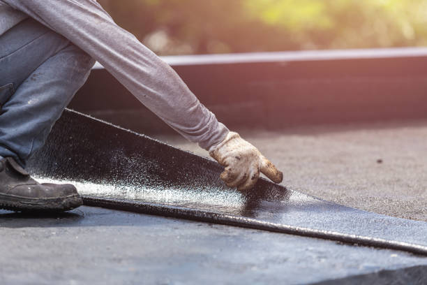 Professional Basement Waterproofing technician working in Lewisburg, KY